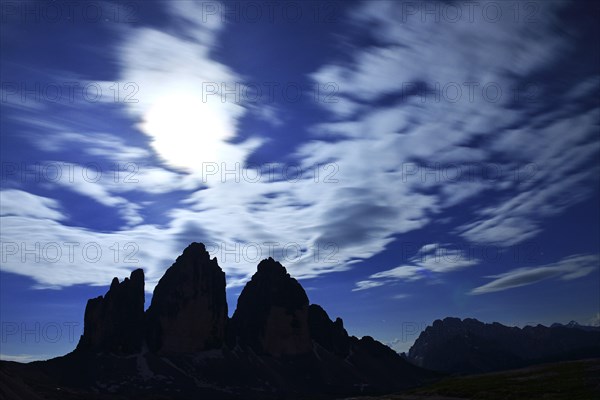 North walls of the Three Peaks of Lavaredo at full moon night