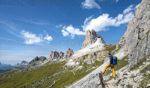 Hiker on the circular hiking trail from Passo Giau via Nuvolau