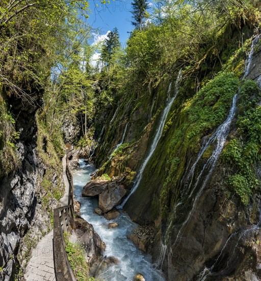 Wodden boardwalk leads along the Wimbach river through the Wimbach Ravine