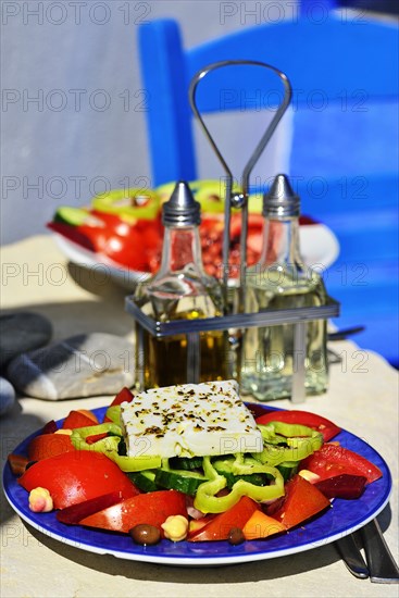 Greek salad with sheep cheese served on plate