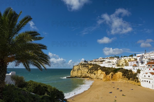 Bay with beach and colourful houses