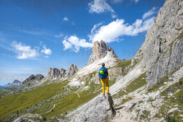 Hiker on the circular hiking trail from Passo Giau via Nuvolau