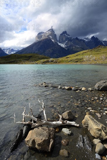 View over Lake Pehoe to the mountains Los Cuernos with clouds