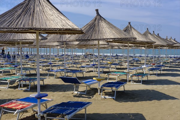 Parasols and sun loungers on the beach in Fushe-Drac near Durres