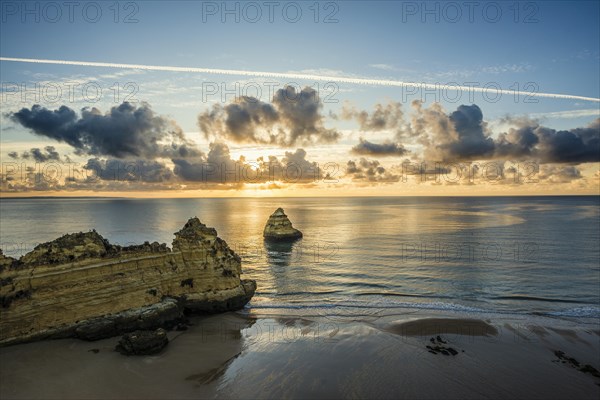 Coloured cliffs and sunrise at the beach