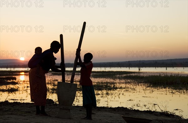 Tonga women at sunset