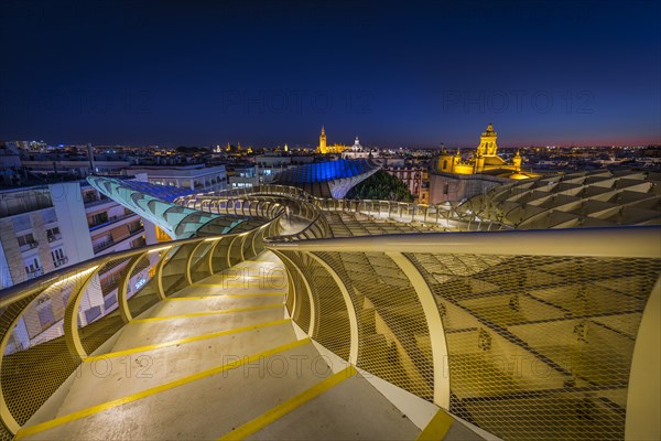 View from Metropol Parasol to numerous churches in the evening