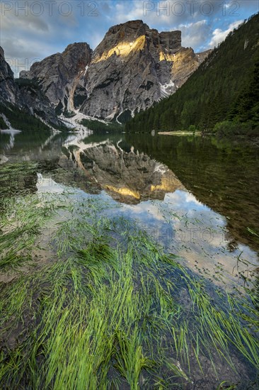 Mountain lake with water reflection