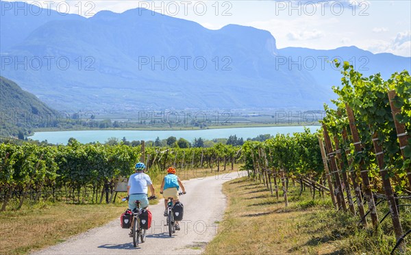 Two cyclists with mountain bike