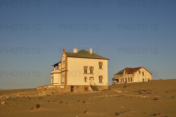 Decaying houses of the accountant and mine manager of the former diamond town Kolmanskop