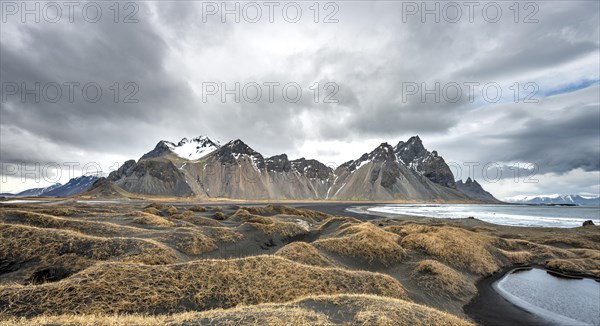 Dunes and black sandy beach