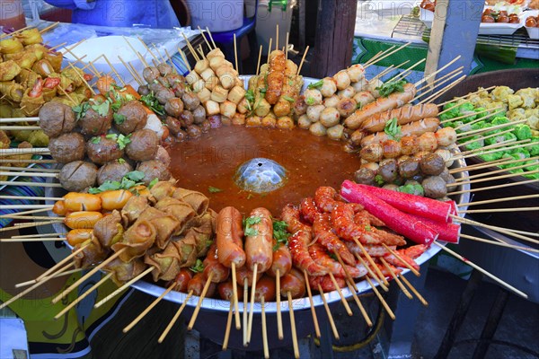 Various meat and seafood skewers