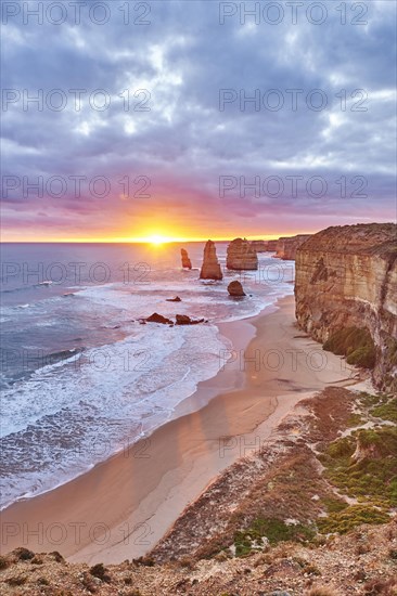 Rocky coast with the Twelve Apostles at sunset