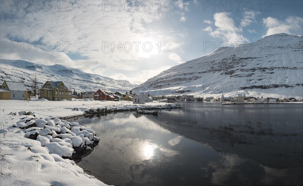 View over the village Seyoisfjorour with snow