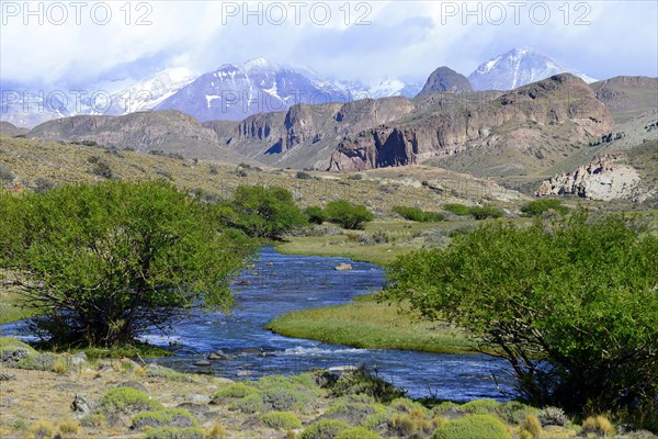 River with mountain panorama in the Meseta del Lago Buenos Aires