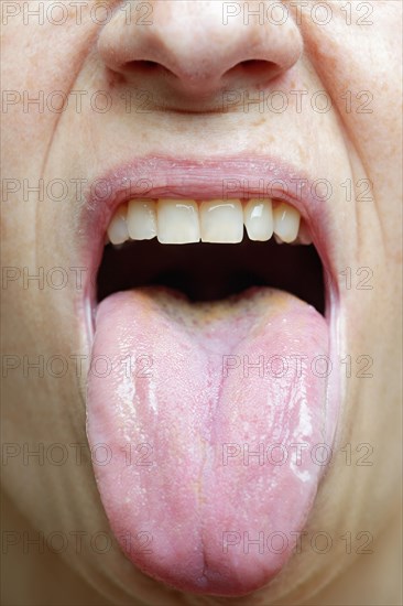 Woman sticking her tongue out