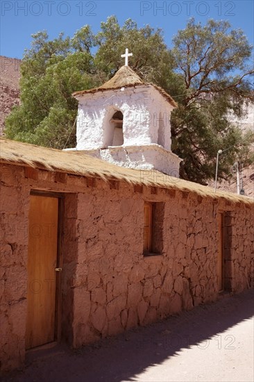 Church in the Adobese style with thatched roof