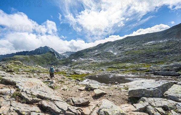 Hiker at a small lake