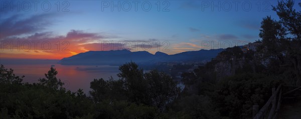 Sunrise and morning red in the gulf of Naples at Sorrento