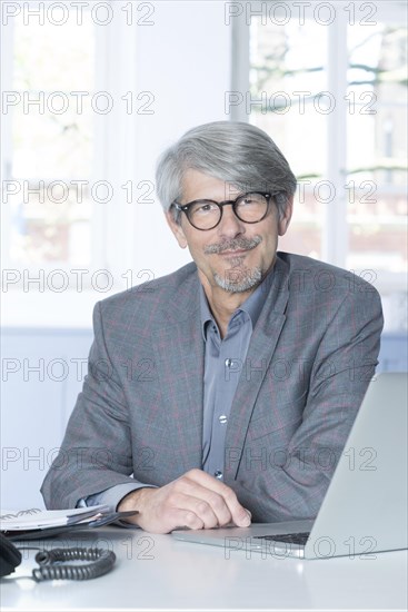 Man working at the laptop in the office