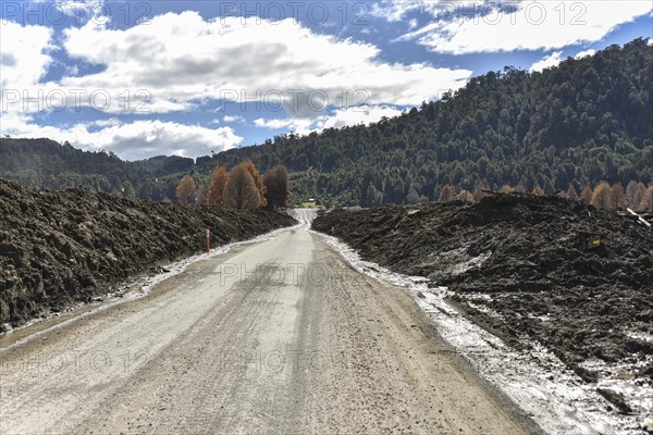 Gravel road with mud masses