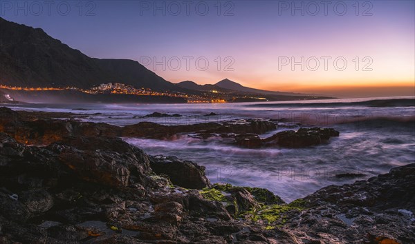 Rocky coast and sea at sunset