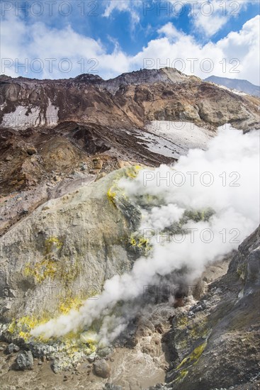 Smoking fumaroles with sulphur depositions on Mutnovsky volcano