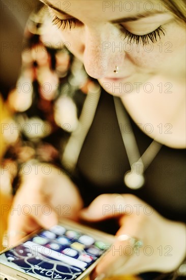 Young woman with her smartphone in her hands