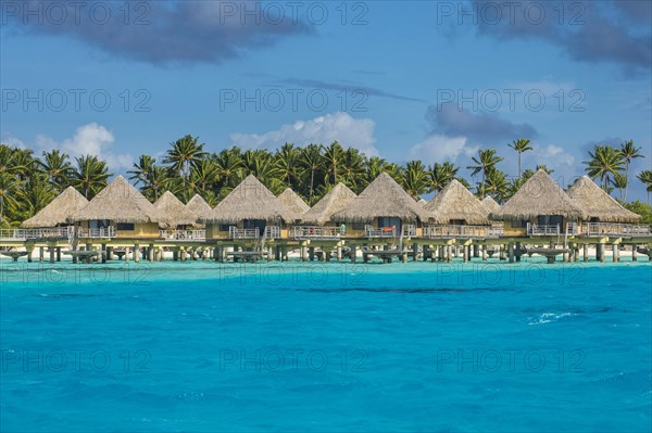 Overwater bungalows in luxury hotel