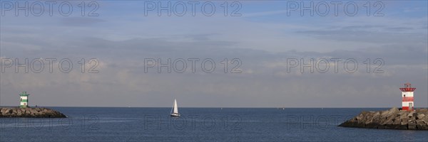 Small lighthouses at harbor entrance