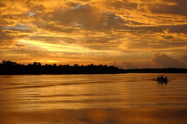 Boat at sunset on river Selangor