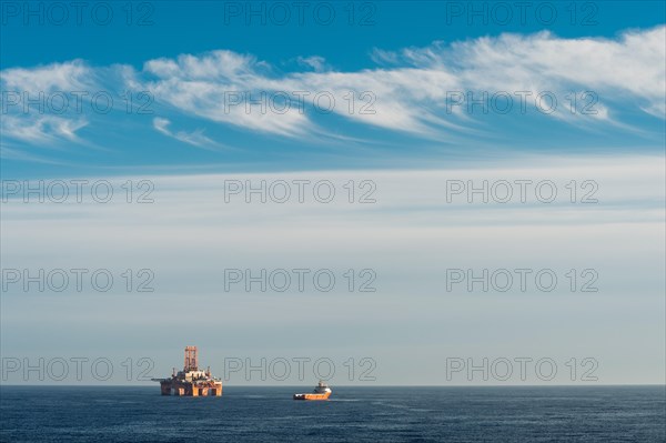 Supply vessel Normand Aurora next to West Phoenix oil rig