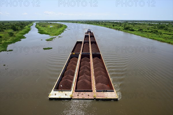 Pusher with iron ore cargo