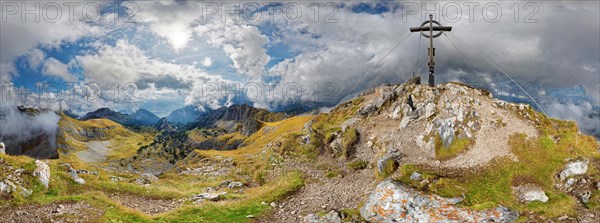360 mountain panorama from Hochiss summit with summit cross and bizarre cloudy sky