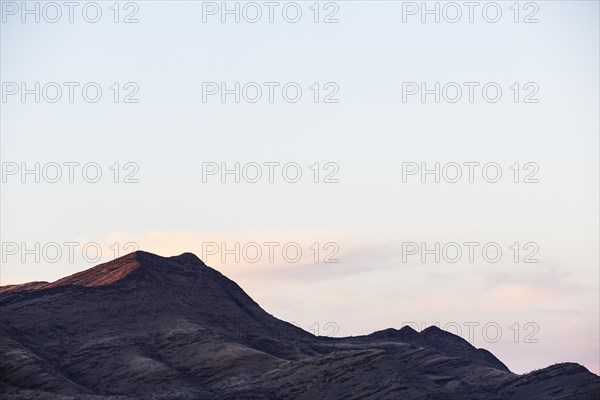 Hilly landscape in evening light