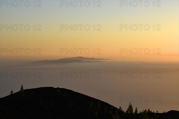 View from Samara Volcano across Teno massif towards La Palma in trade clouds