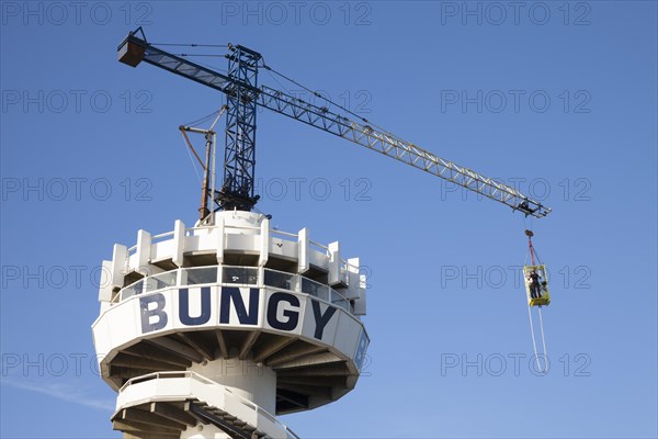 Bungy jump tower with bungy jumper