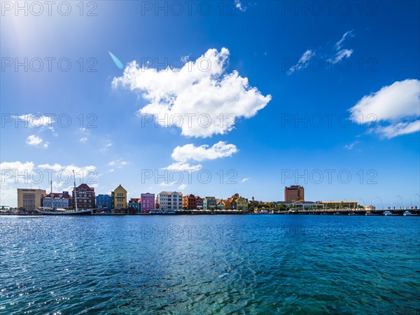 Colorful row of houses in Dutch-Caribbean colonial style on the waterfront