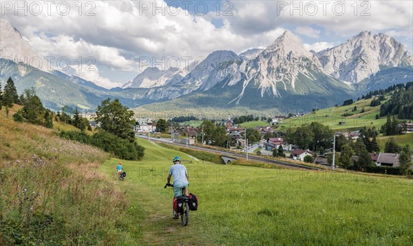 Cyclist on bike tour with mountain bike