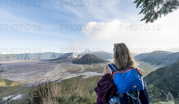 Tourist in front of landscape