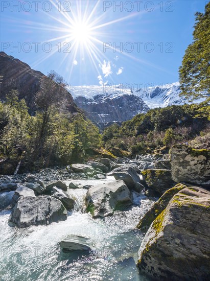 Glacial river flowing through mountains