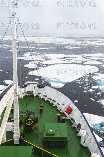Expedition Boat navigating through melting pack ice