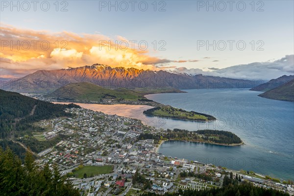 View of Lake Wakatipu and Queenstown at sunset