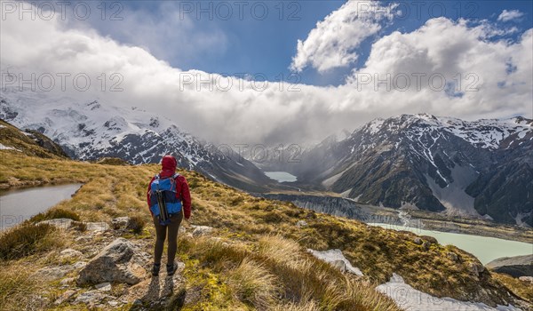 Hiker looking into Hooker Valley