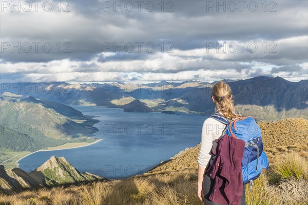 Female hiker looking at lake