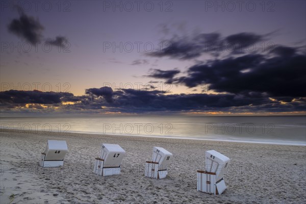 Beach chairs at the west beach of Hornum in the evening light