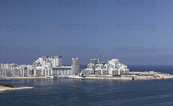 Spit of land with office and apartment buildings