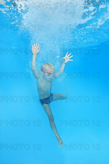 Little boy with swimming goggles