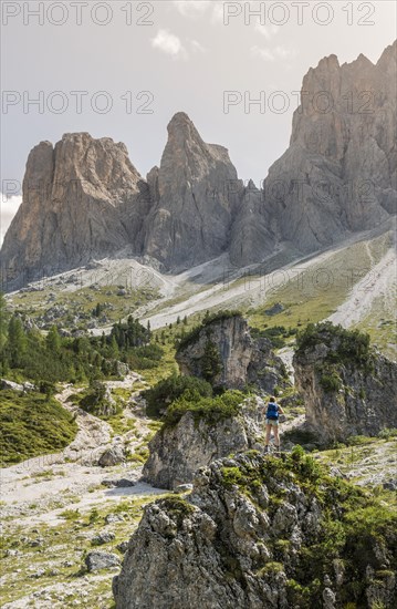 Hiker standing on rocks