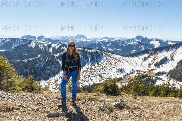 Hiker on the way to Brecherspitz in spring